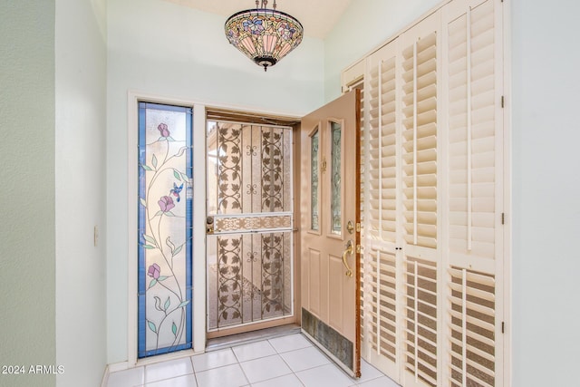 entryway featuring light tile patterned flooring