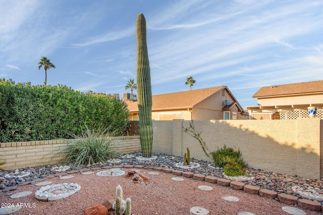 view of yard with a fenced backyard