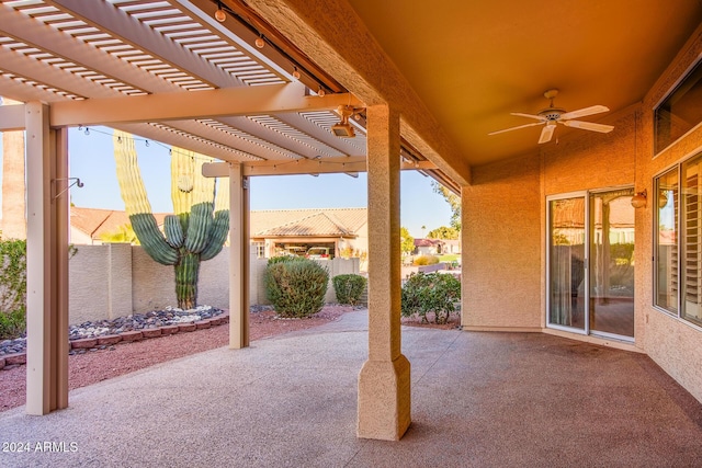 view of patio / terrace featuring a pergola, ceiling fan, and fence