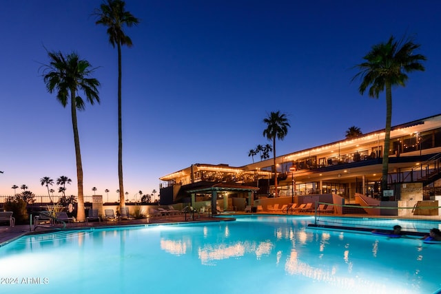 community pool with a patio area