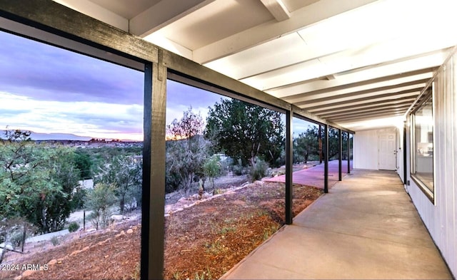 view of patio terrace at dusk