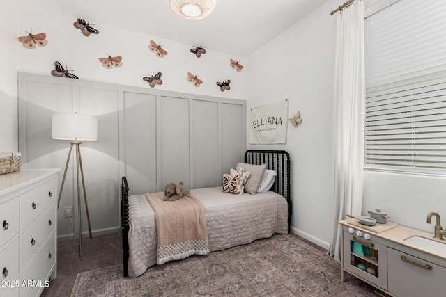 9418 W Minnezona Ave, Phoenix, AZ 85037 - bedroom featuring baseboards and carpet floors