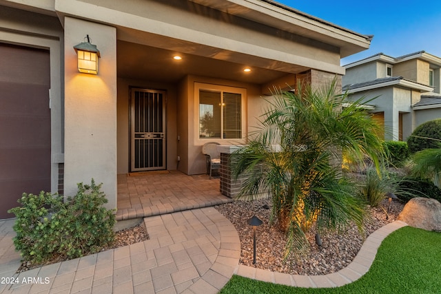 property entrance featuring a garage