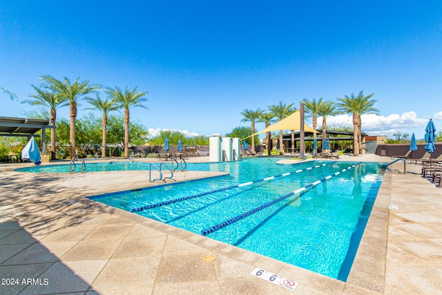 view of pool featuring a patio area