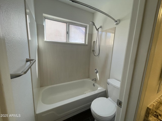 full bath featuring toilet and shower / washtub combination