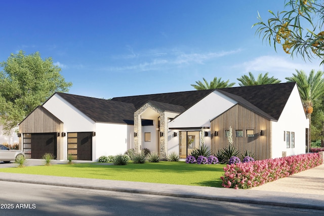 view of front facade featuring a garage and a front yard