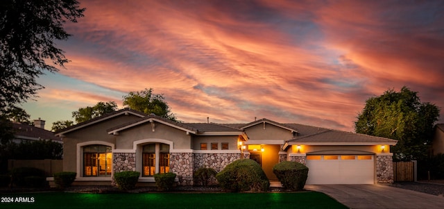 view of front of home with a garage