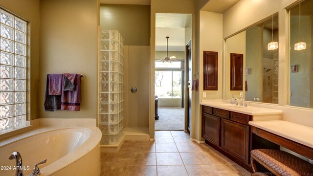 bathroom featuring separate shower and tub, tile patterned flooring, ceiling fan, and vanity