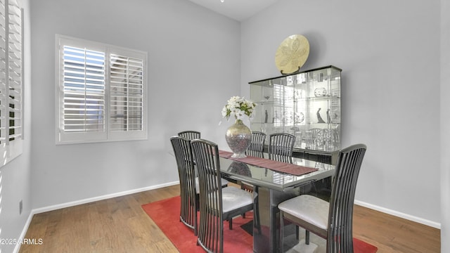 4276 E Meadowview Dr, Gilbert, AZ 85298 - dining space with baseboards and wood finished floors