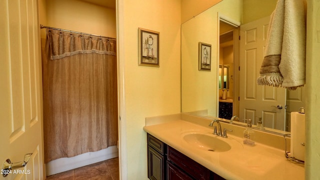 bathroom with tile patterned floors, vanity, and shower / bath combination with curtain