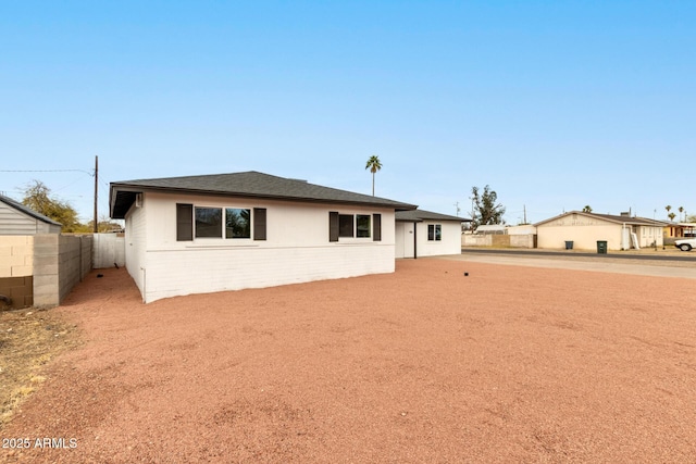 view of front of property with fence