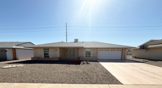 ranch-style home with a garage