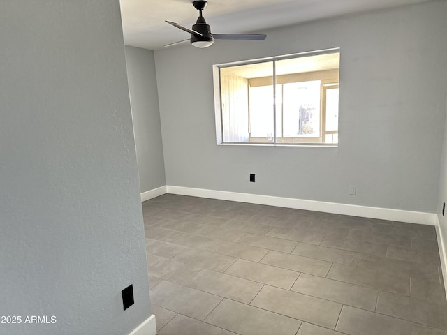5924 W Tierra Buena Ln, Glendale, AZ 85306 - unfurnished room featuring a ceiling fan, baseboards, and tile patterned flooring