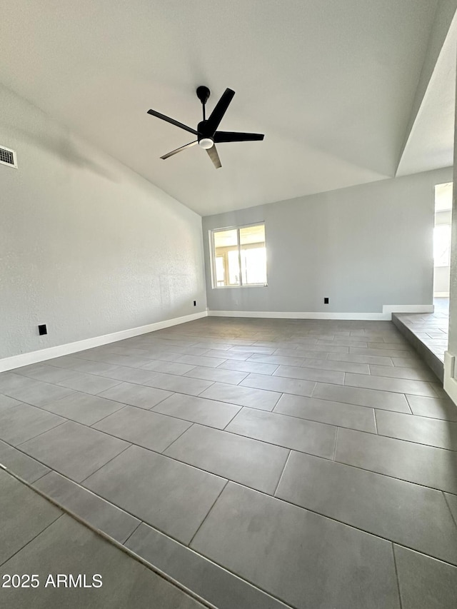 5924 W Tierra Buena Ln, Glendale, AZ 85306 - tiled empty room featuring ceiling fan and baseboards