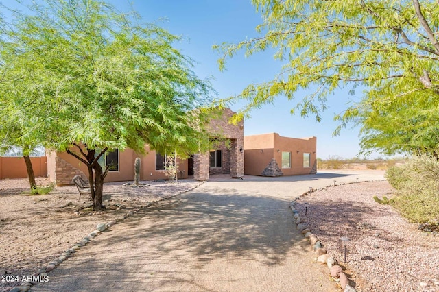 view of adobe home