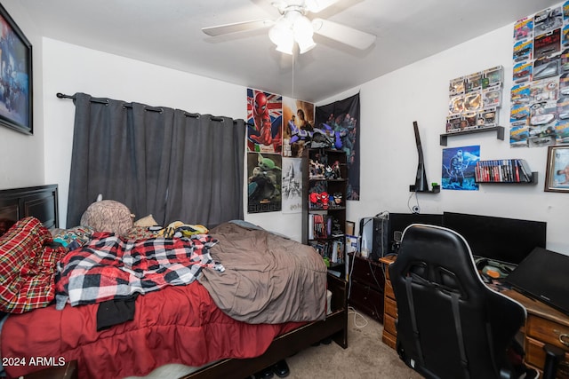 bedroom with light carpet and ceiling fan