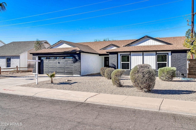 ranch-style home with a garage