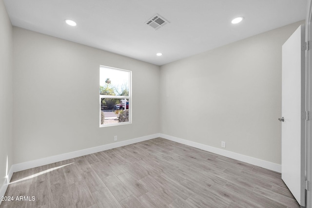 empty room featuring light hardwood / wood-style floors