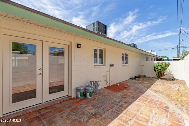 exterior space featuring french doors, fence, and a patio area
