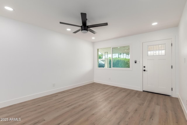 entryway with recessed lighting, a ceiling fan, and light wood finished floors