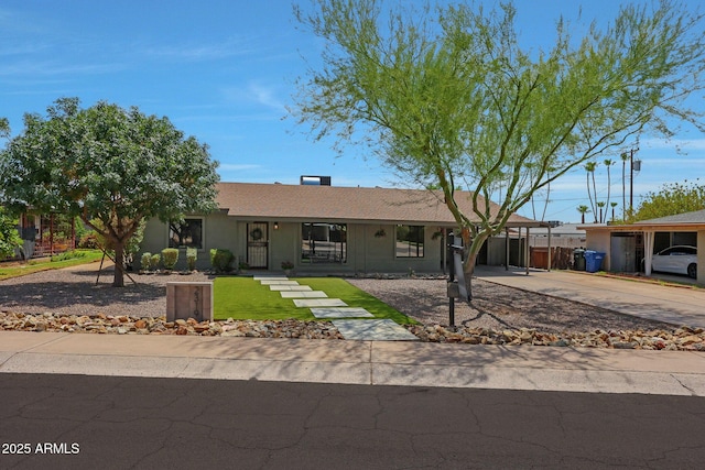 ranch-style home with a carport