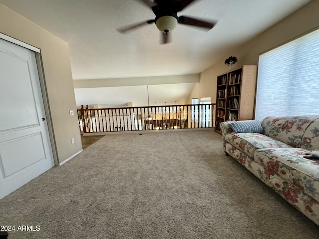 unfurnished room with carpet flooring, ceiling fan, and lofted ceiling