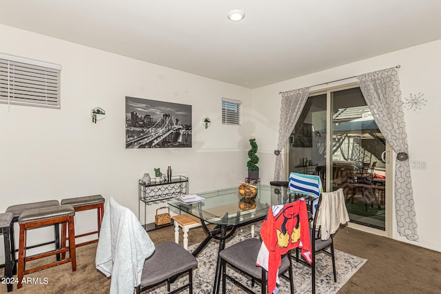 view of carpeted dining area