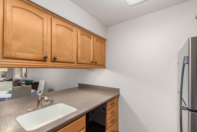 kitchen with stainless steel refrigerator, dishwasher, and sink