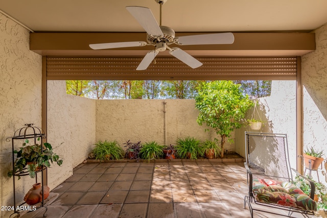 view of patio / terrace featuring ceiling fan