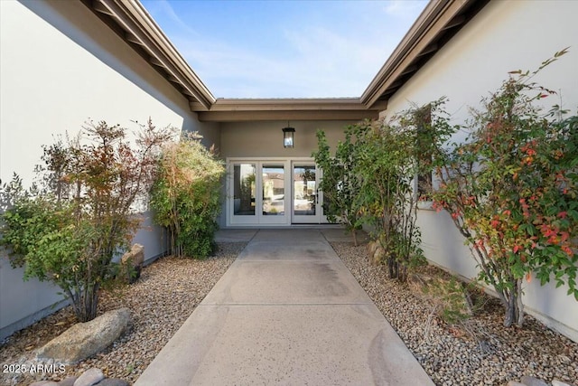 doorway to property with a patio and french doors