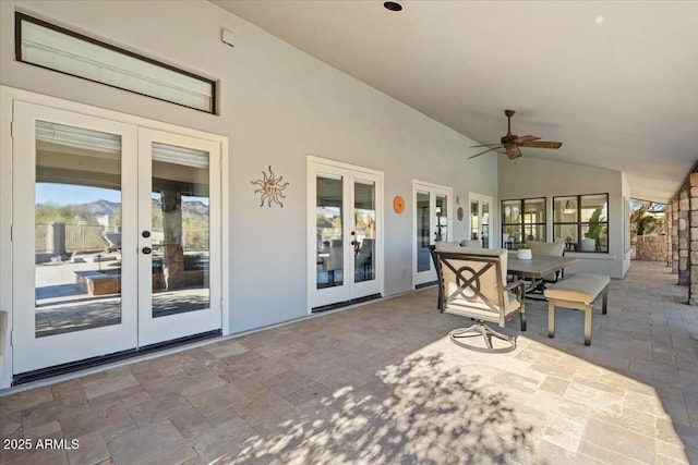 view of patio featuring ceiling fan and french doors