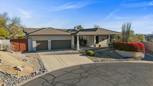 single story home featuring a garage