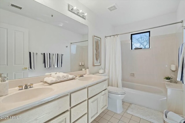 full bathroom featuring shower / tub combo with curtain, vanity, toilet, and tile patterned flooring