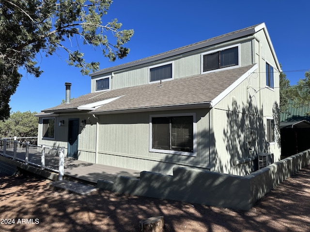 view of front of house featuring a wooden deck