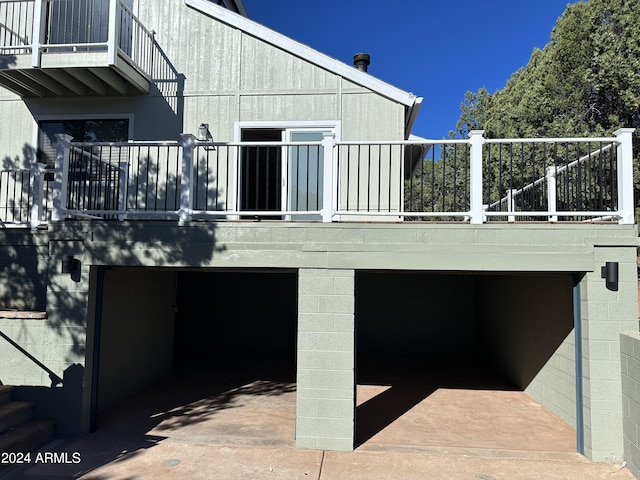 view of patio featuring a garage