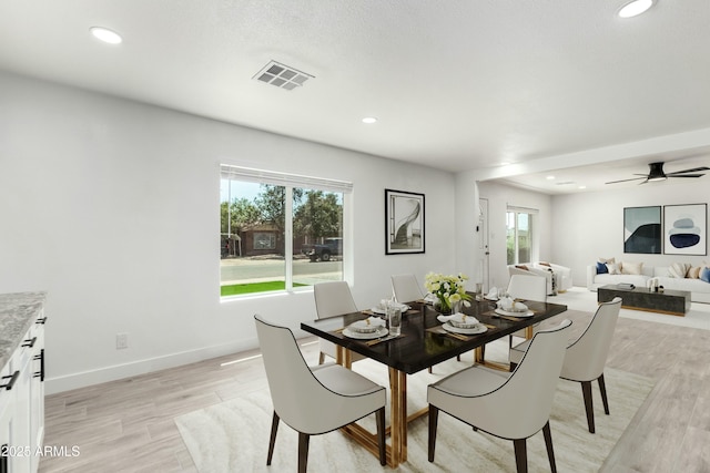 dining area with recessed lighting, plenty of natural light, and visible vents