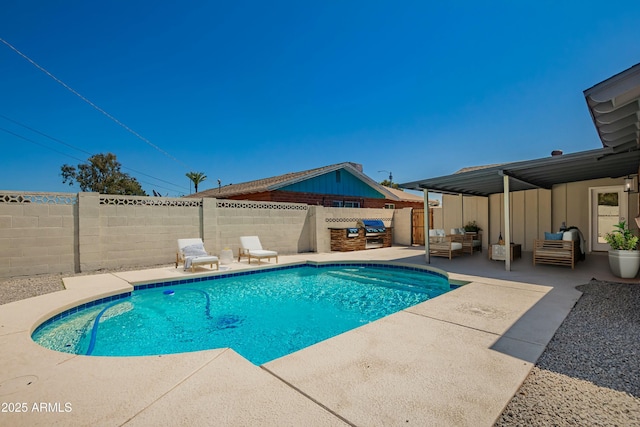 view of pool with a fenced backyard, a patio area, an outdoor hangout area, and a fenced in pool