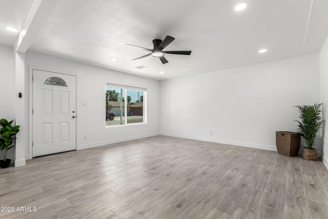 unfurnished living room with visible vents, recessed lighting, a ceiling fan, and light wood-style floors