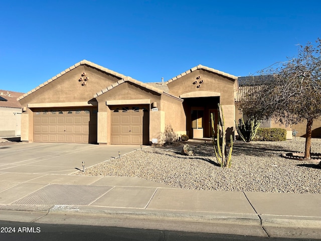 view of front of home with a garage