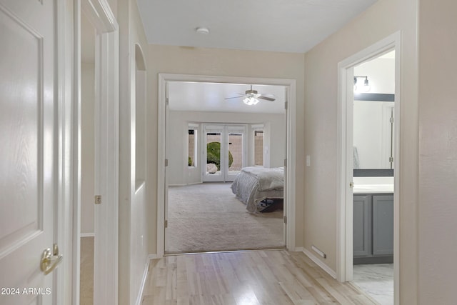 hall featuring light wood-type flooring