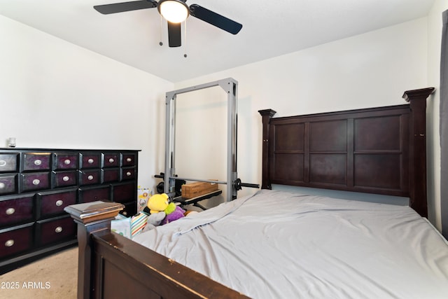 bedroom featuring ceiling fan and light colored carpet