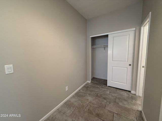 unfurnished bedroom featuring a closet