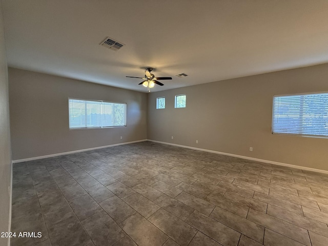 spare room featuring ceiling fan