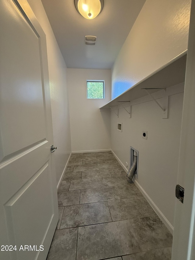 laundry room featuring hookup for a washing machine and hookup for an electric dryer