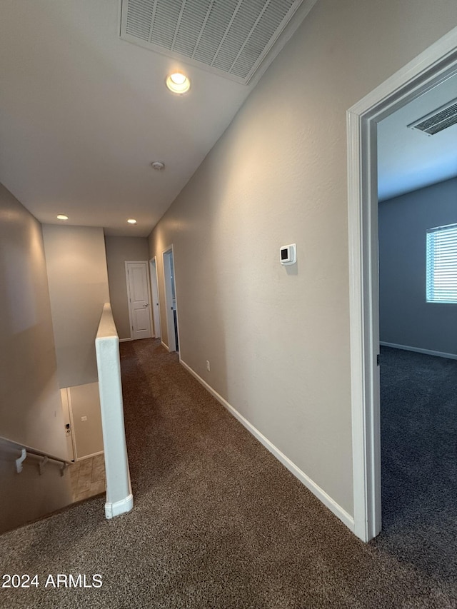 hallway featuring carpet