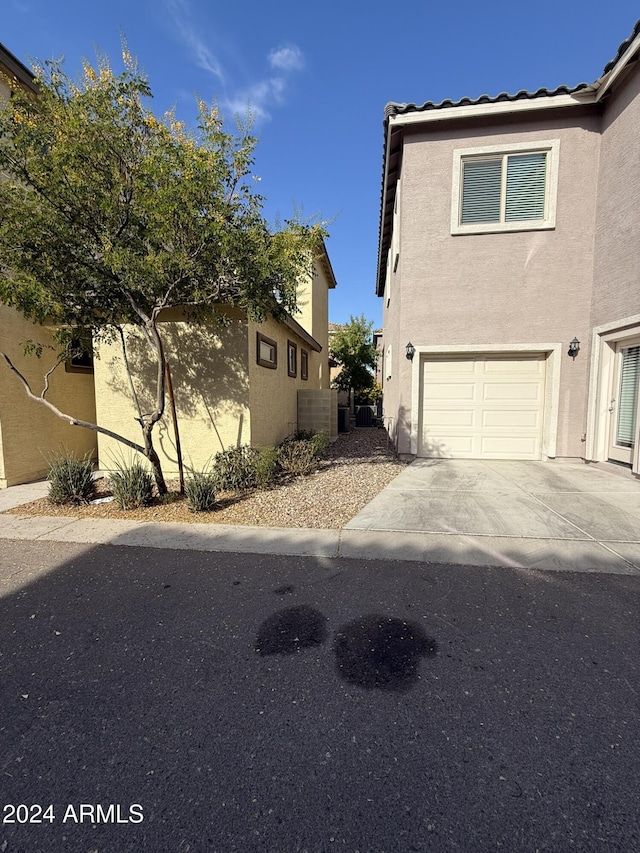 view of front of home with a garage