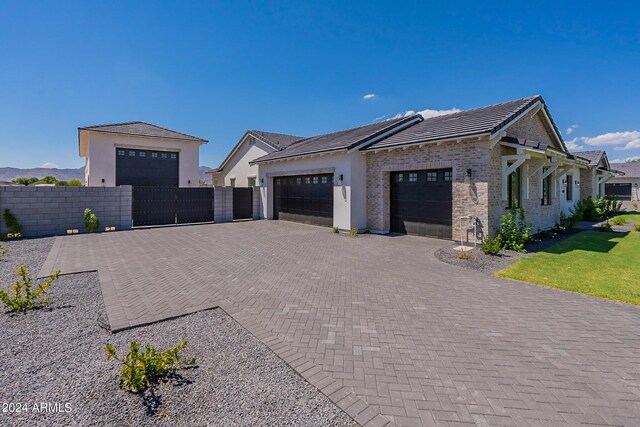 view of front of property with a garage