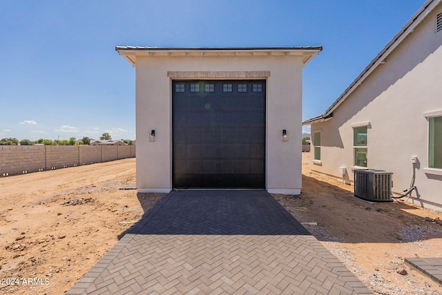 garage featuring central AC unit