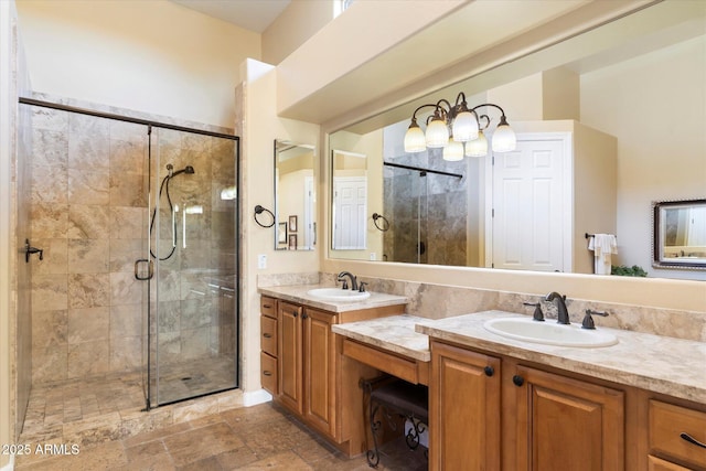 bathroom featuring walk in shower and vanity