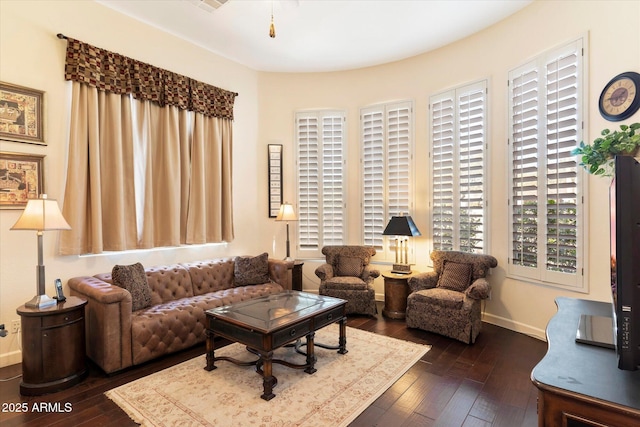 living room featuring dark wood-type flooring